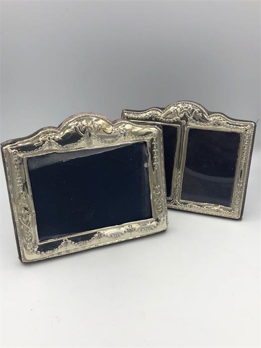 Two decorative silver photo frames 14cm x 18cm