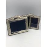 Two decorative silver photo frames 14cm x 18cm