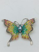 A silver and plique A Jour Butterfly brooch