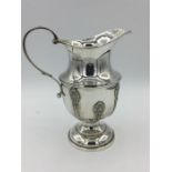 A silver Elkington & Co jug, hallmarked Birmingham 1927-28