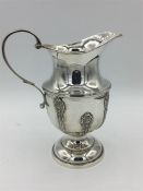 A silver Elkington & Co jug, hallmarked Birmingham 1927-28