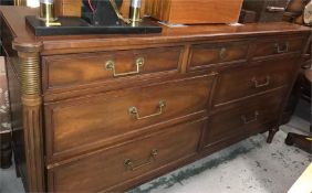 A sideboard with reeded sides