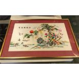 A framed Chinese silk print