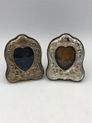 A pair of small ornate hallmaked silver picture frames