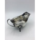 A silver sauce boat, makers mark EV, hallmarked Sheffield 1945 (104g)