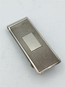 A silver money clip, hallmarked London 1989, makers mark DB