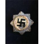 A Reproduction German Cross in Silver WWII