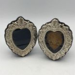 A pair of hallmarked silver picture frames, heart shaped.