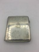 A Silver cigarette case, hallmarked Birmingham 1922/23