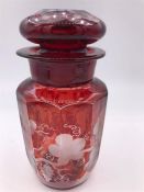 A mid 19th Century Bohemian ruby overlay glass pickle jar engraved with vine and grapes