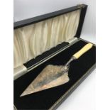 A ceremonial trowel in boxed case bearing the inscription: 'This trowel was used by his excellency