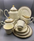 A Minton Tea Set St James's pattern to include teapot, sugar bowl, milk jug, two cups and saucers,