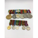 A medal bar, dress bar and various military insignia for Frederic George Hudson