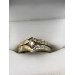 A 9ct gold wedding and engagement ring set