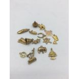 A selection of 9ct gold charms (11.8g)