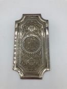 A Persian silver plate and small tray