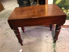 A low mahogany commode style stool