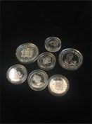 Seven silver proof coins in plastic cases, 2006 Gibraltar 5 pound crown, 1994 Jamaica 25 dollars,