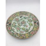A Mid 19th Century Chinese Famile Rose plate with a butterfly theme