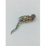 A silver and Plique A Jour Parrot Brooch
