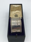 A Boxed hallmarked napkin ring J.D & S 1912-13