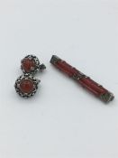 A Carnelian stone set of earrings and brooch.