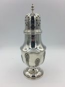 A silver sugar sifter by Elkington & Co, hallmarked 1928/29