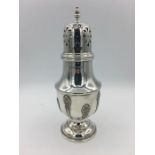 A silver sugar sifter by Elkington & Co, hallmarked 1928/29