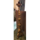 A large wooden candlestick