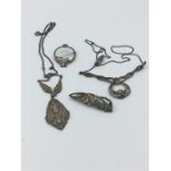 Four silver and marcasite items of jewellery