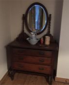 A mahogany dressing table with mirror