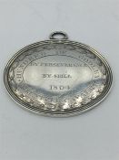 A silver medallion celebrating the The Hundred of Godley Volunteer Cavalry 'By Perseverance By Skill