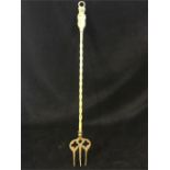 A Brass toasting fork