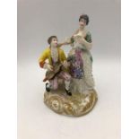 Meissen porcelain figures of a man serenading a lady