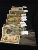 A selection of Japanese bank notes 1930-1945 including military issue