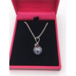 A white gold south sea pearl and diamond pendant necklace