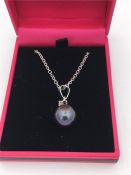 A white gold south sea pearl and diamond pendant necklace