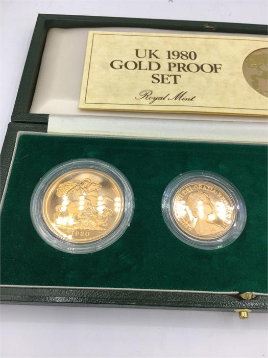 A UK 1980 Gold Proof set in 22ct gold, five pound, two pound, sovereign, half sovereign coin - Image 2 of 3