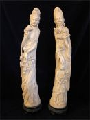 A pair of Faux Ivory Oriental statues