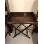 A George III mahogany butlers tray with three quartered galleryand gally stand