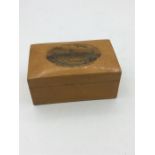 A Mauchlin ware trinket box with lid depicting the Aquarium winter garden Yarmouth