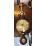 An early Victorian mahogany Wheel Barometer by Carughi of London with 27 cm silvered dial engraved