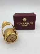 A Krug Champagne stopper in original box