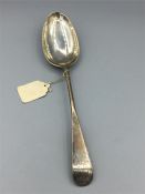 A silver spoon, hallmarked Edinburgh 1780