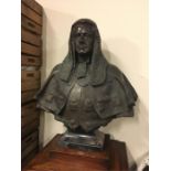 A large Bronze bust of a Judge on a mahogany plinth by Allan G Wyon