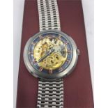 A Gents Harlem wristwatch with open case and extra strap lines