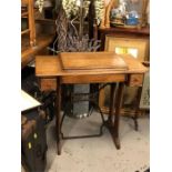 A Singer sewing machine table.
