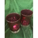 A Pair of pink glass candle holders