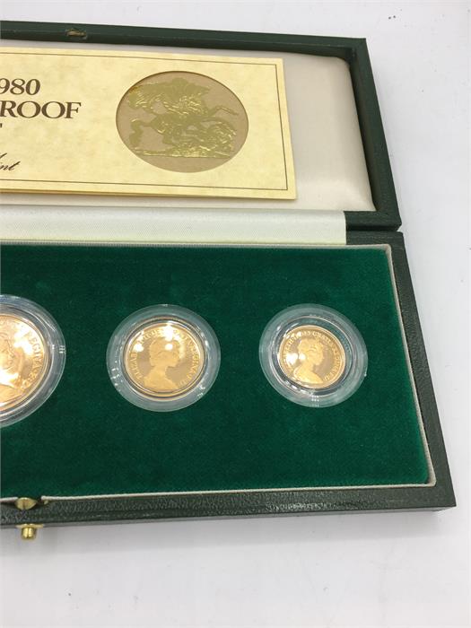A UK 1980 Gold Proof set in 22ct gold, five pound, two pound, sovereign, half sovereign coin - Image 3 of 3