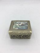 A 19th Century Chinese silver trinket box with mother pf pearl lid.
